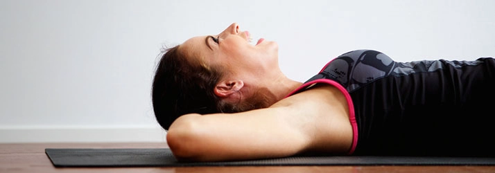 Chiropractic Reno NV Woman Laying On Mat